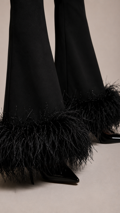 Black trousers with feather trim