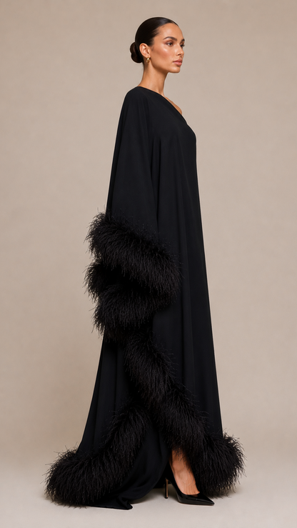 Black evening gown with feathered sleeves and hem