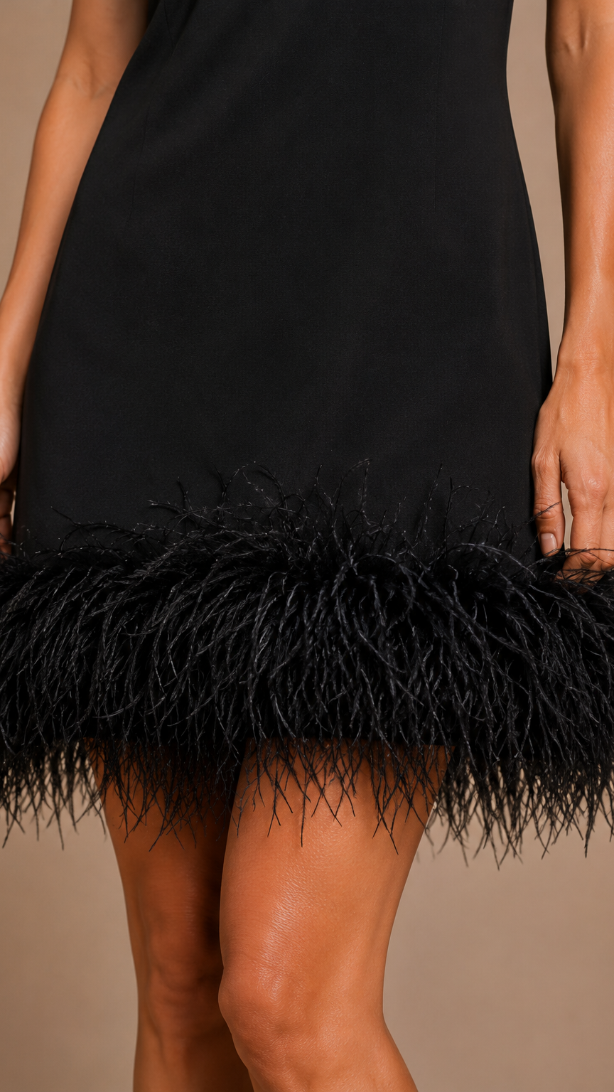 Black dress with feathered hem