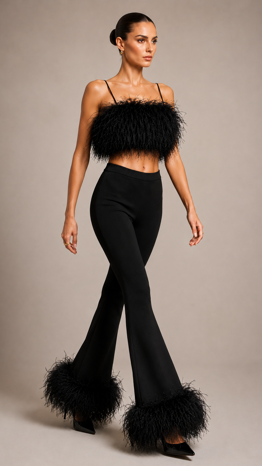 Woman wearing a black outfit with feathered details