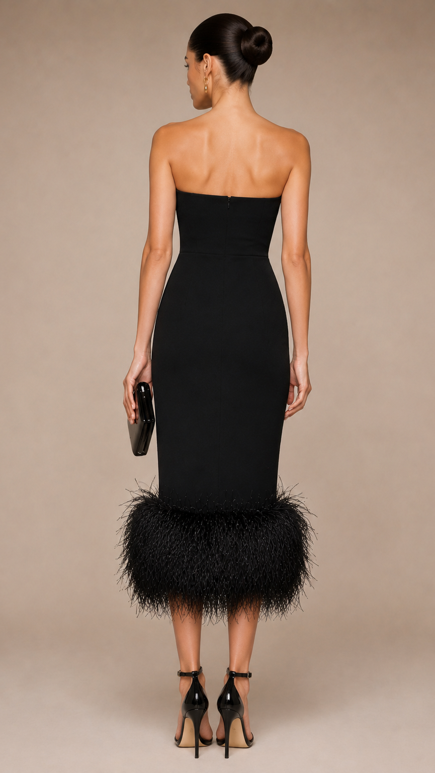Woman wearing a black strapless  feathered dress